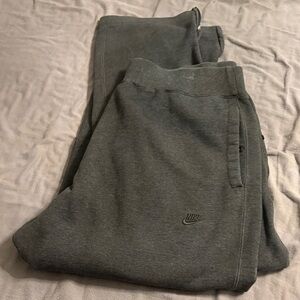 Nike Charcoal Joggers- thick and warm.  Snapped pockets and zippered ankle.